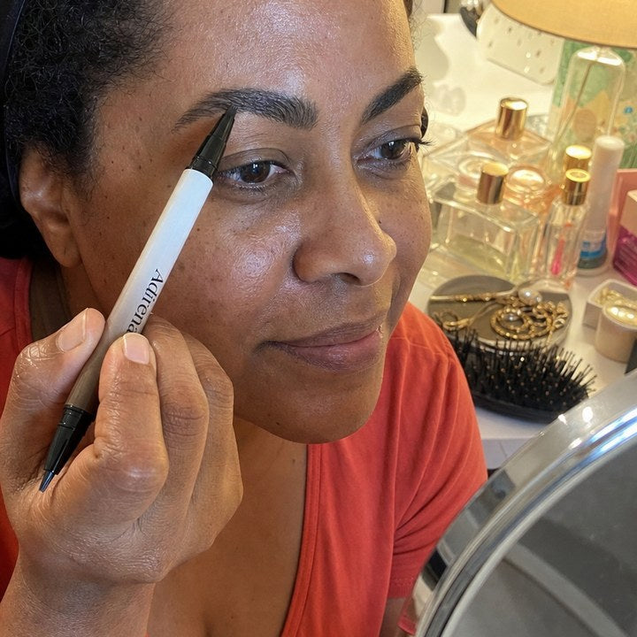 Michelle holding Adirena Adirena Brow Pen