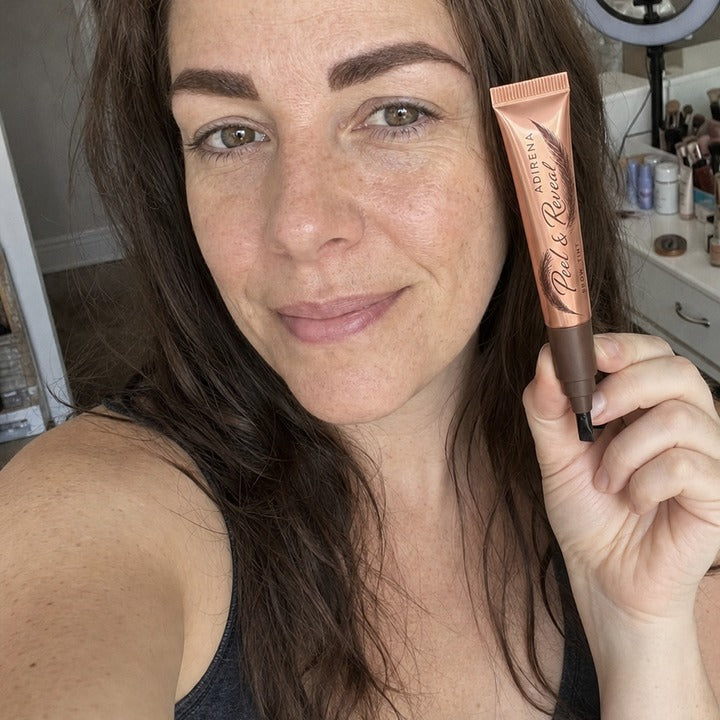 Tanya holding Adirena Peel & Reveal Brow Tint