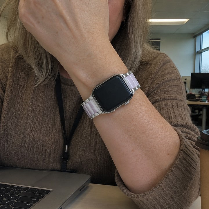 Sheri wearing the Adirena Metal Resin Band for Apple Watch at her office desk