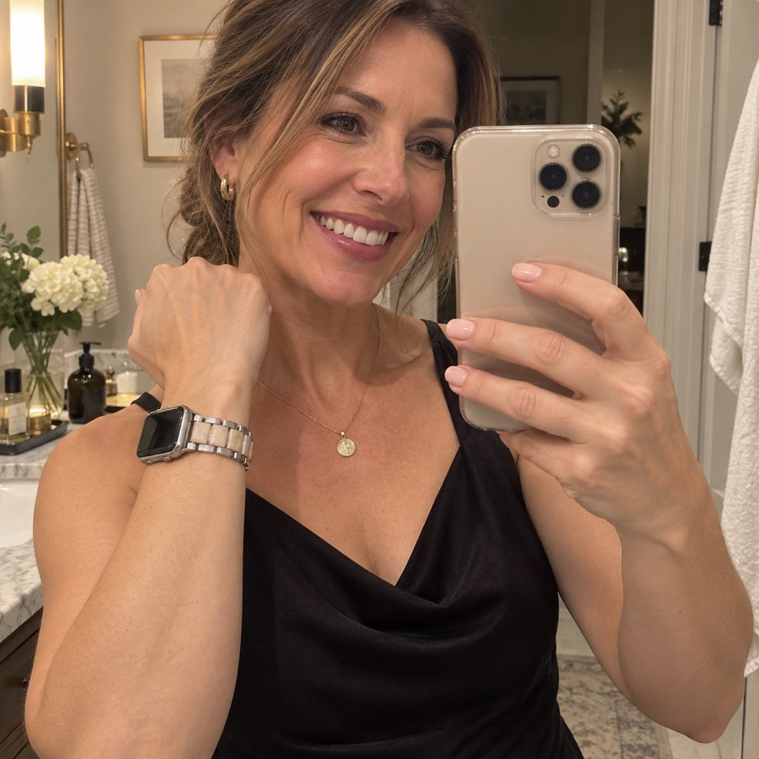 Kiki wearing the Adirena Metal Resin Band for Apple Watch leaning on her kitchen counter