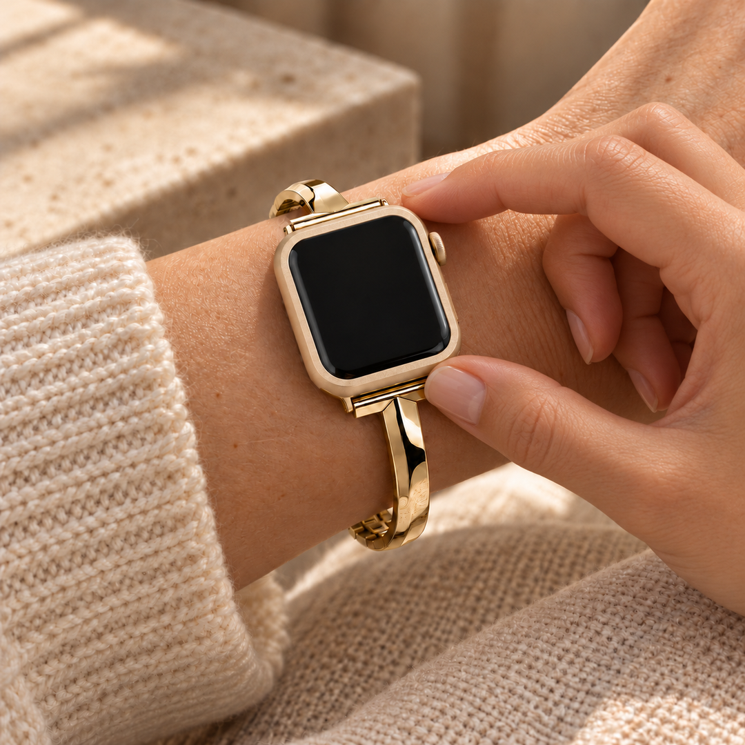Fingers touching the seated Halo gold case frame on a watch