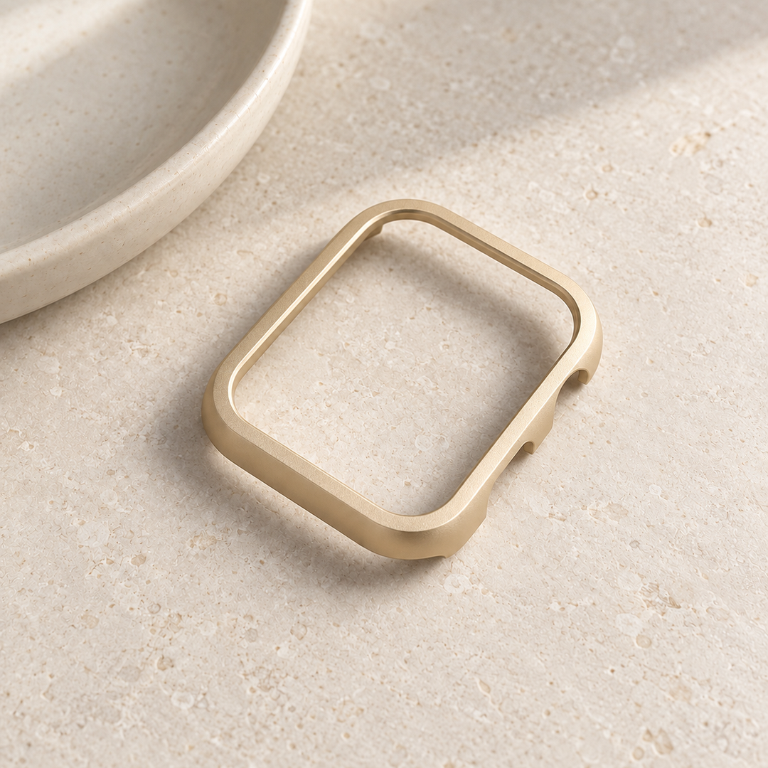 The Halo gold case frame on its own, showing its open front and side walls