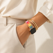 Adirena Prism watch bands stacked with gold jewelry on a wrist