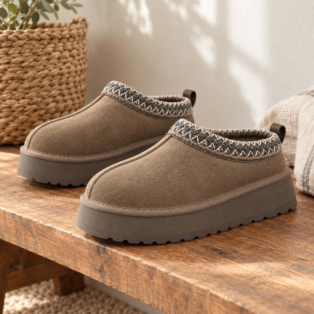 Walnut Alder platform slipper pair on a wooden bench.