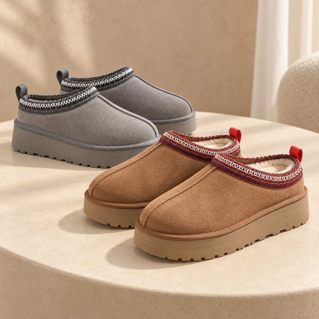 Chestnut and Grey Aspen platform slipper pairs on a warm cream table.