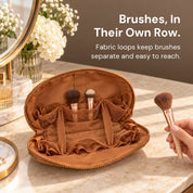 A hand holds a brush above open Brown Clara, with two brushes stored inside