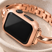 Close-up of the Halo rose gold case frame's matte finish at the crown and side-button cut-outs
