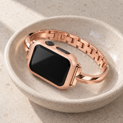 Halo rose gold case frame on a watch with a Madison rose gold band