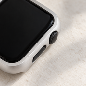 Close-up of the Halo silver case frame's matte finish at the crown and side-button cut-outs