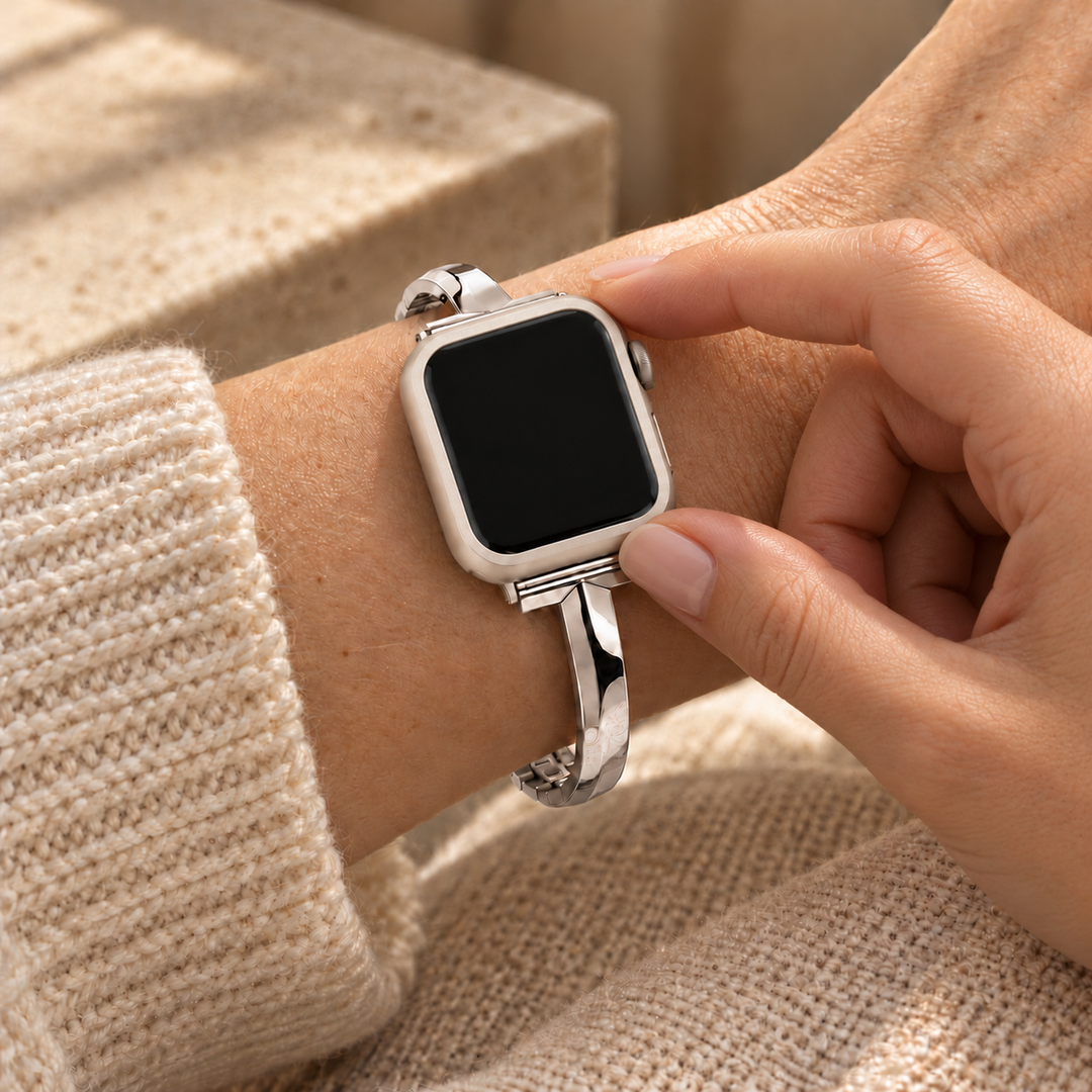 Fingers touching the seated Halo starlight case frame on a watch