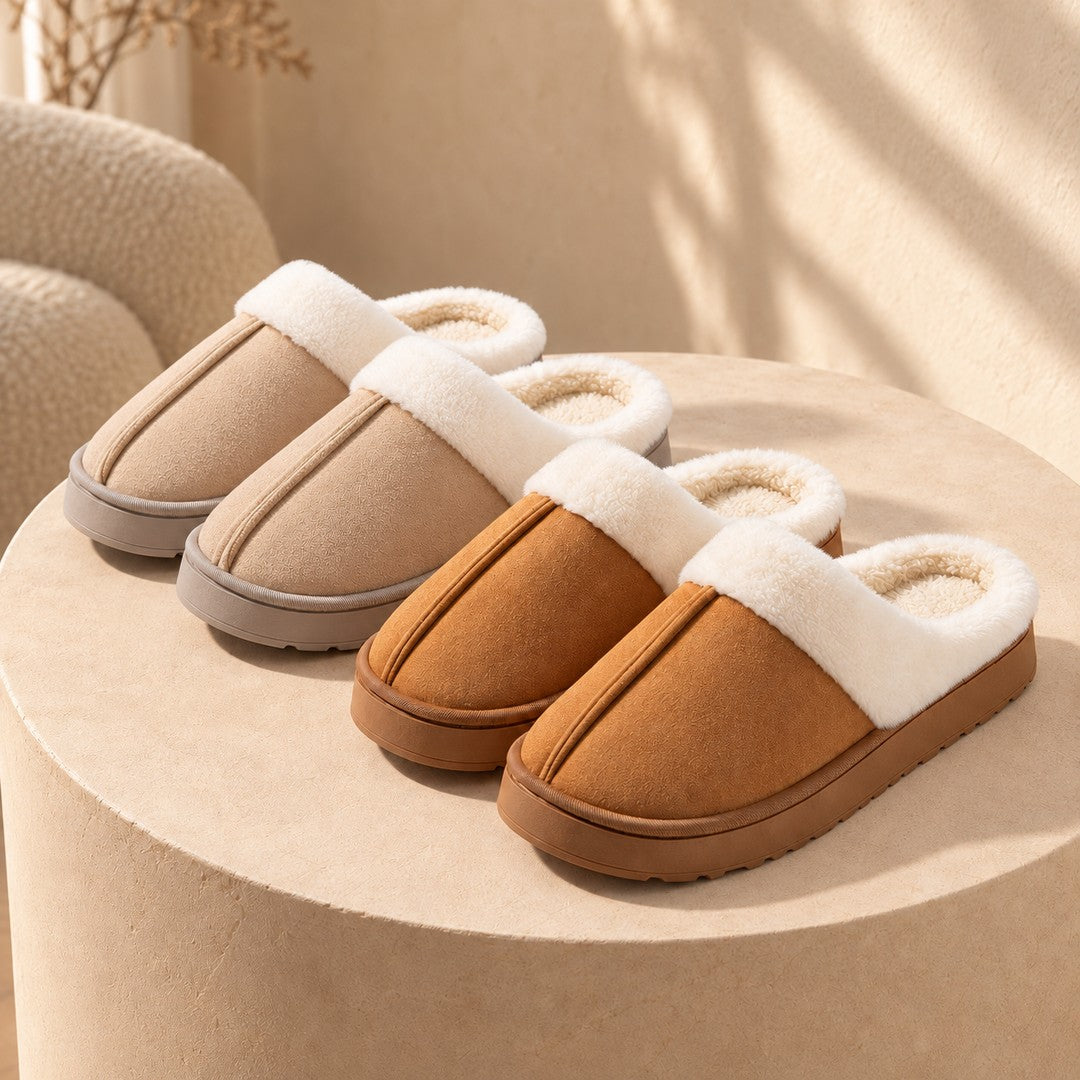 Two pairs of Haven slippers in Chestnut and Khaki, with closed toes and white plush collars.
