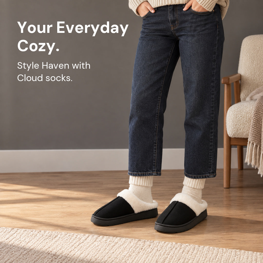 Black Haven slippers styled with pale ribbed Cloud socks and cropped dark jeans.
