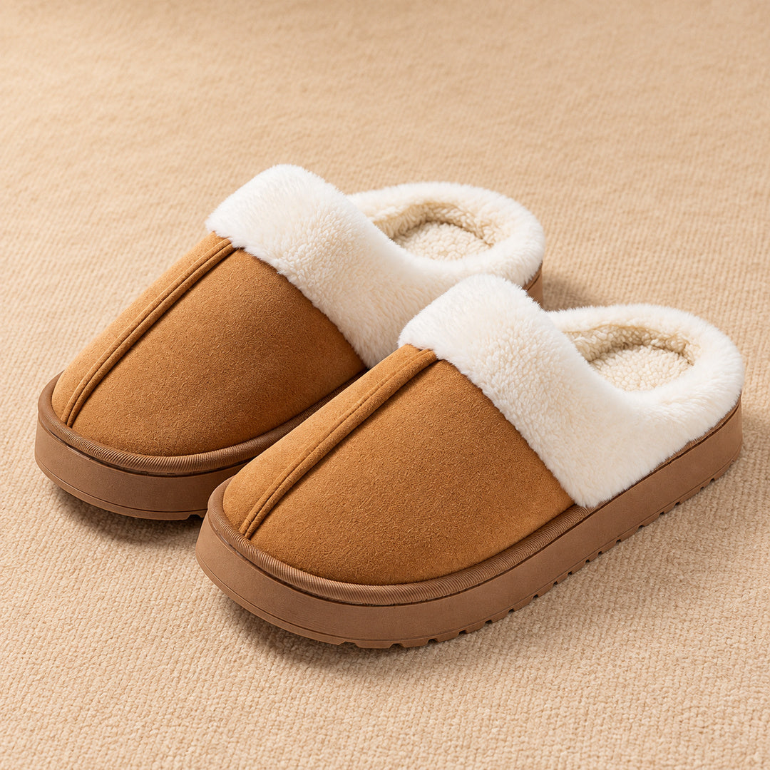 Chestnut Haven slippers with a raised centre seam, white plush collar and low brown sole.