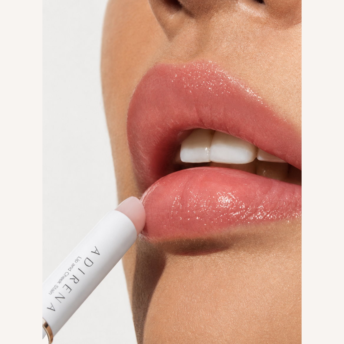 Applying the Adirena lip and cheek stain