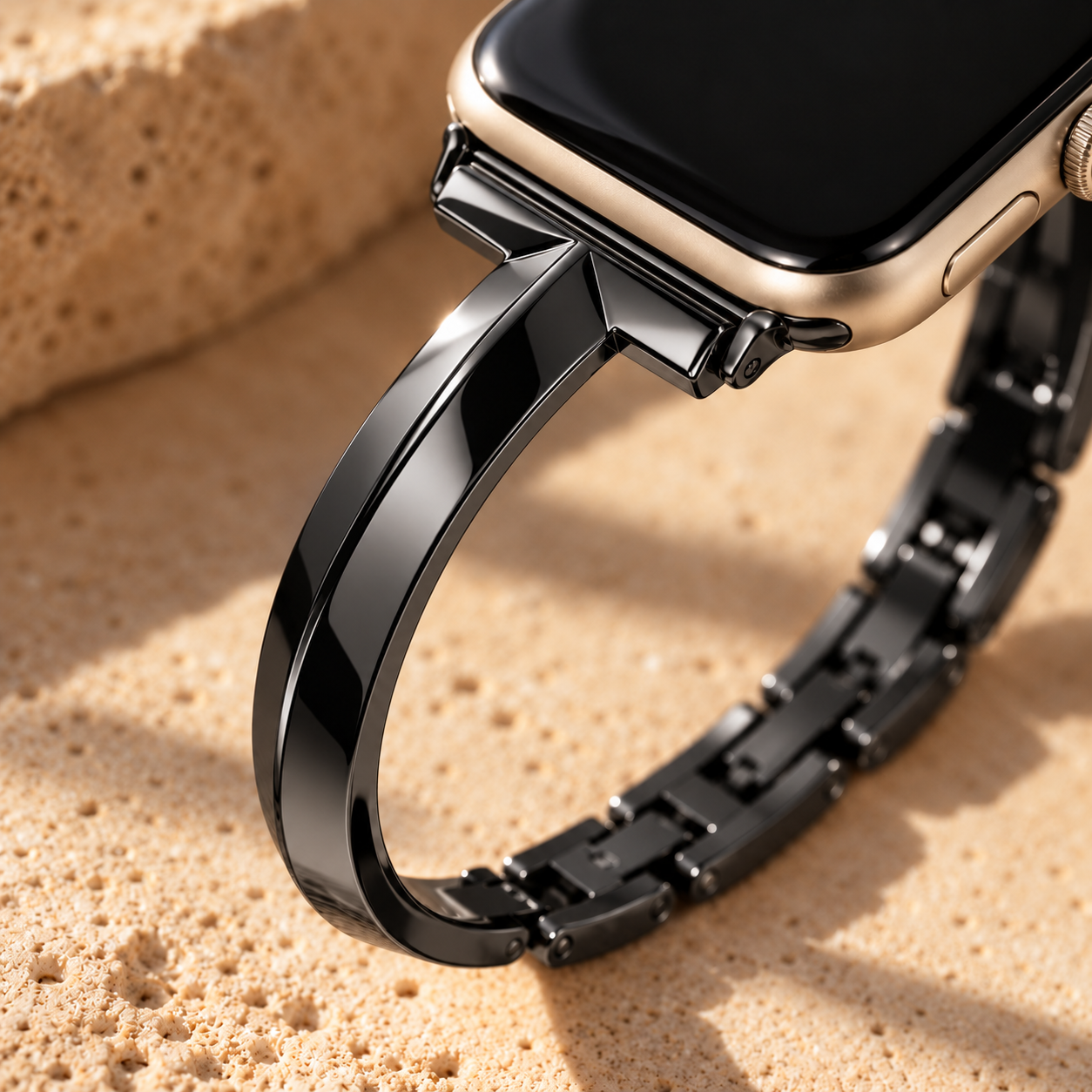 Close-up of the Nightglint black band where the polished arms meet the watch