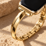 Close-up of the Madison gold band where the polished arms meet the watch