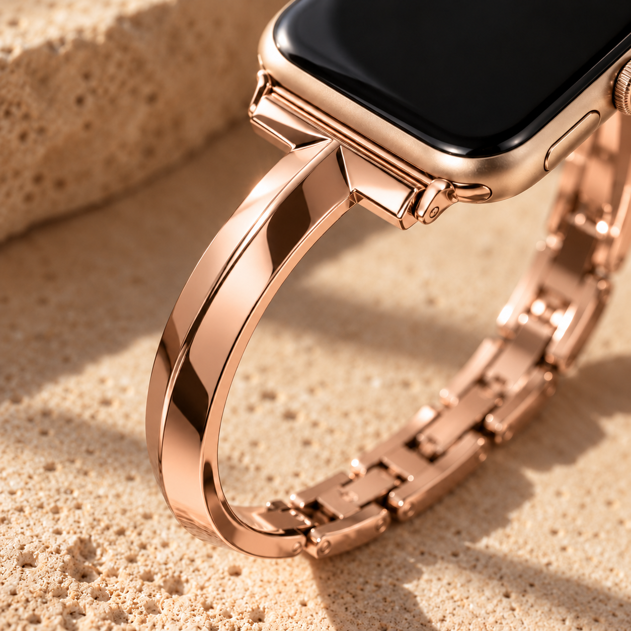 Close-up of the Blusharc rose gold band where the polished arms meet the watch