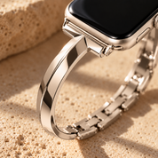 Close-up of the Dawngleam starlight band where the polished arms meet the watch