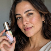Color-correcting primer smoothed on the face for an even tone