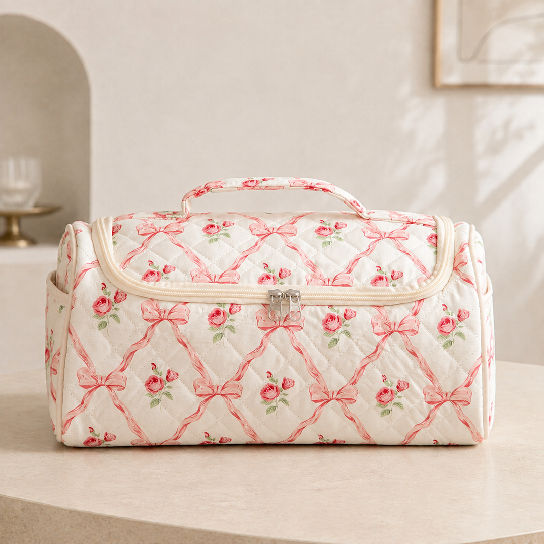 A quilted hair-tool case in the rose lattice pattern, closed and seen straight on