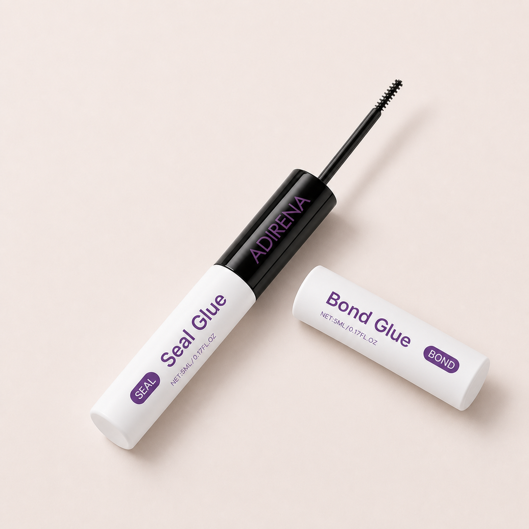 Adirena Lash Bond & Seal with the bond end open and its black micro brush withdrawn
