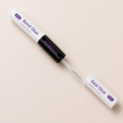 Adirena Lash Bond & Seal with the seal end open and its clear spoolie withdrawn