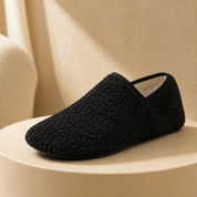 A pair of black barefoot travel slipper socks side by side