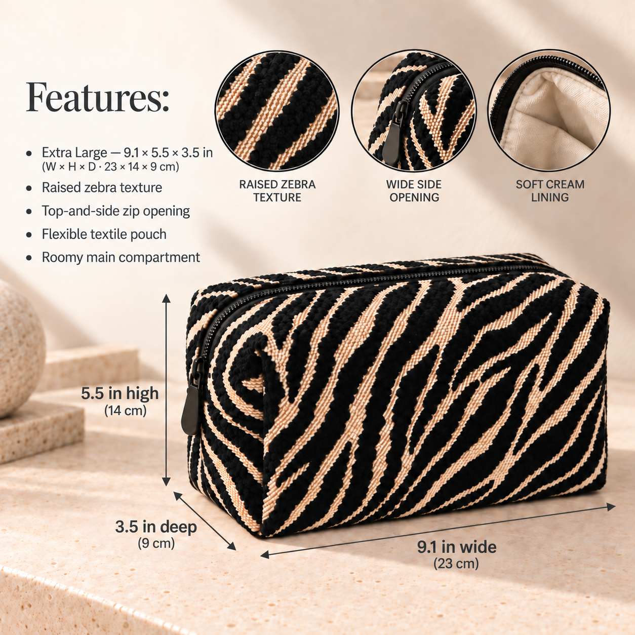 Ziggy XL black and cream zebra makeup bag feature card with US-first dimensions: 9.1 inches wide by 5.5 inches high by 3.5 inches deep, with metric equivalents.