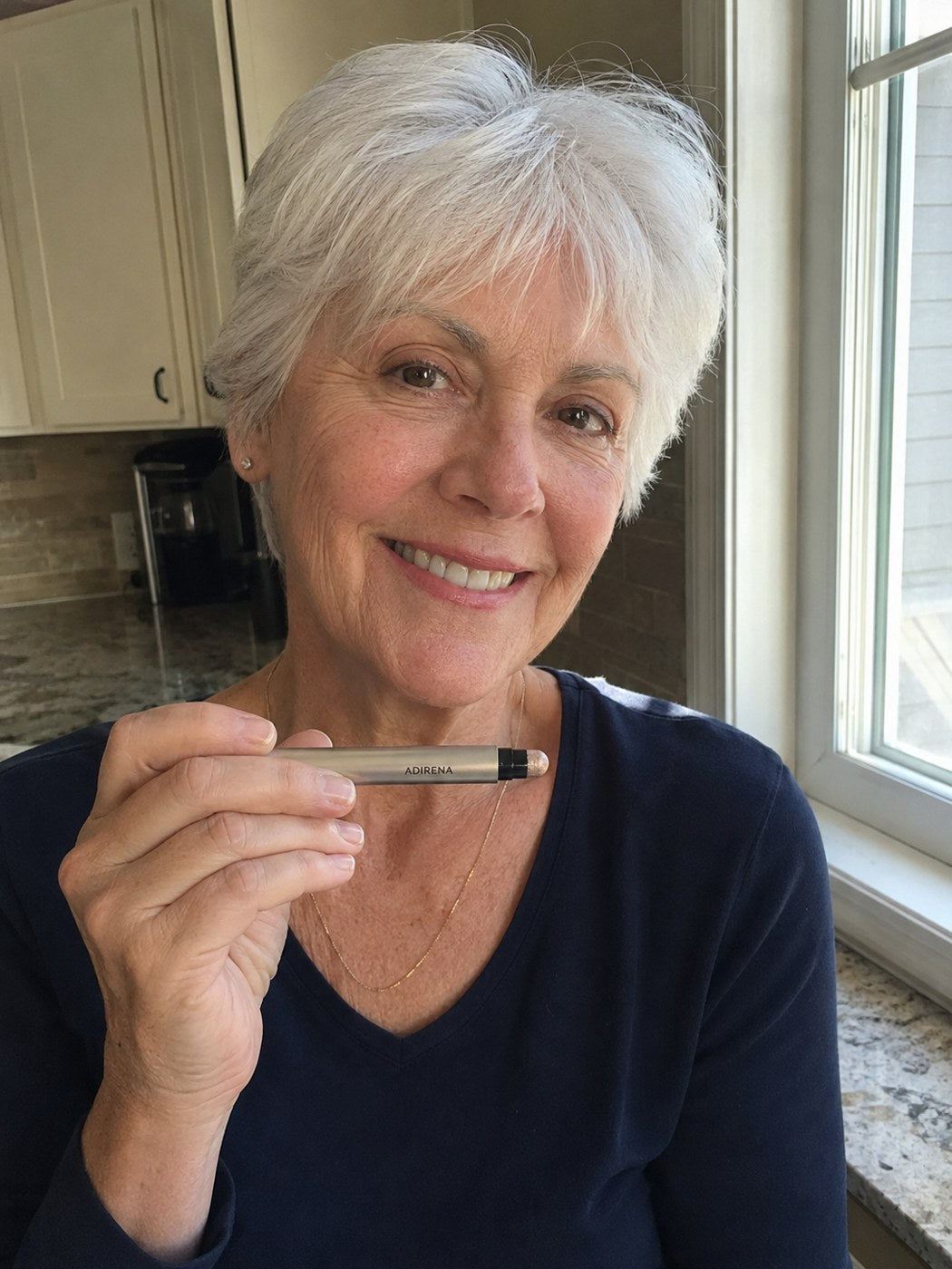 Gail holding Adirena Soft Focus Gel Eyeshadow