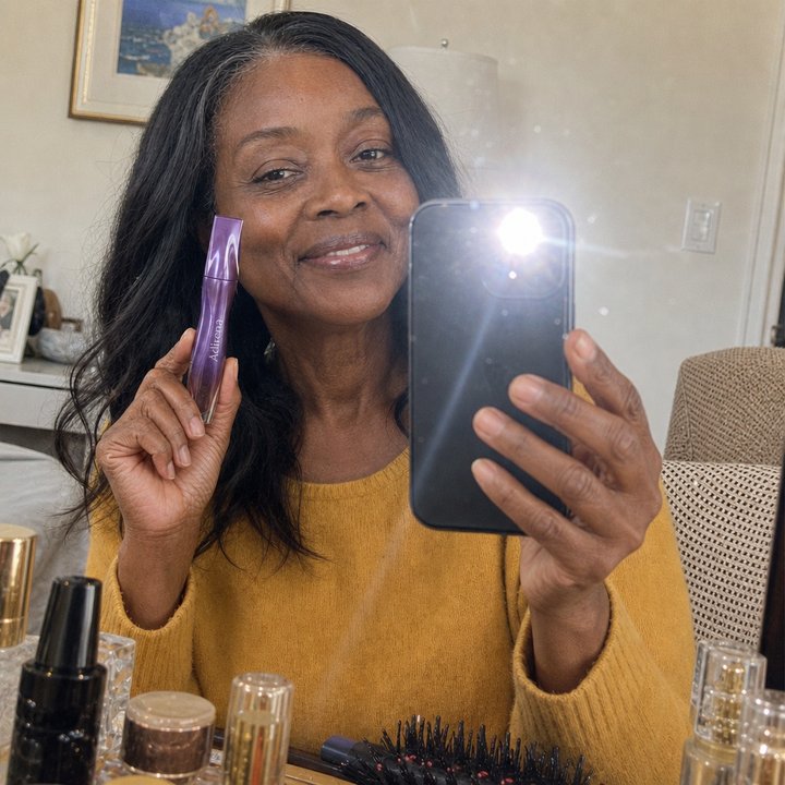 Yolanda holding Adirena Velvet Blur Lip Cream
