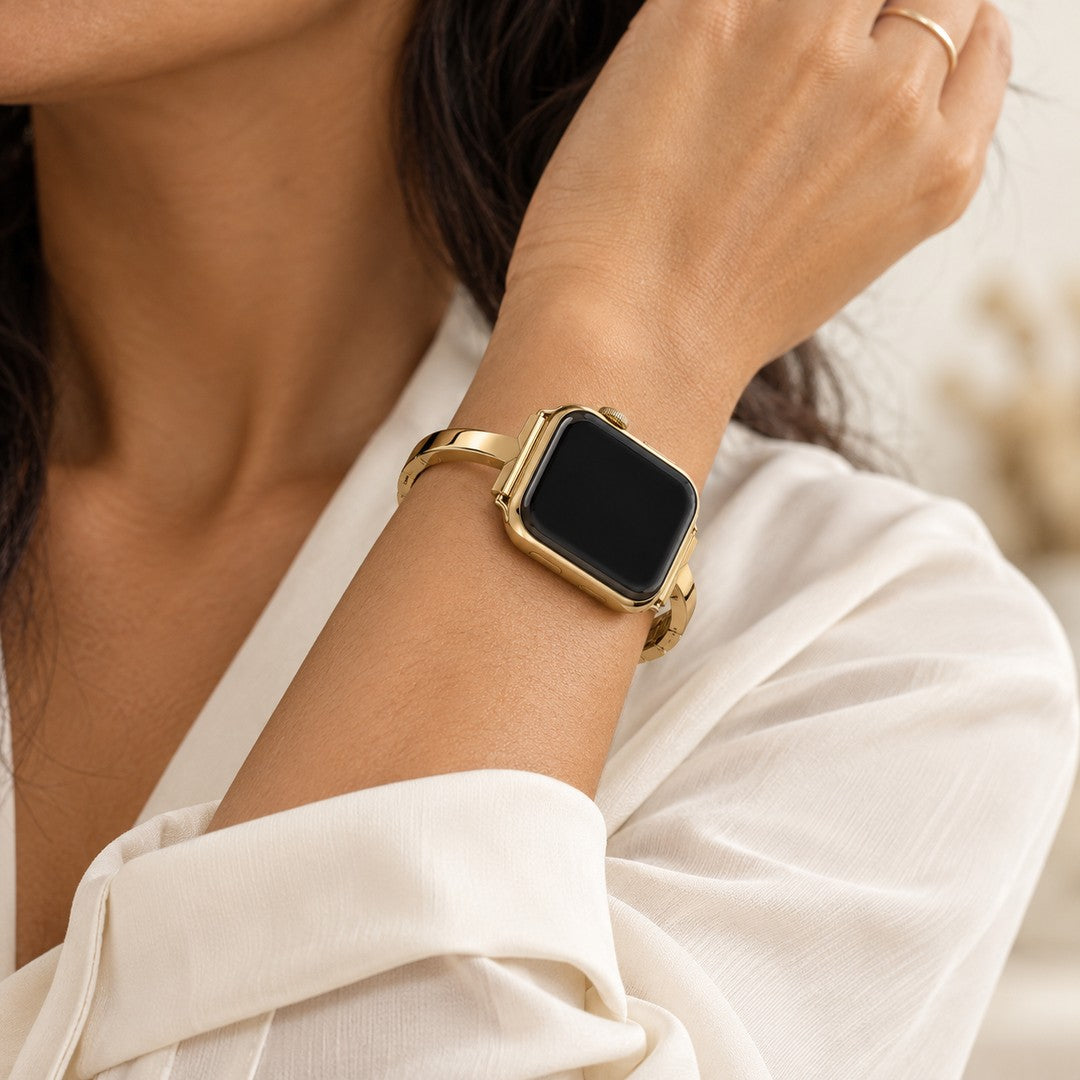 Madison Black, worn on a raised wrist with a white blouse